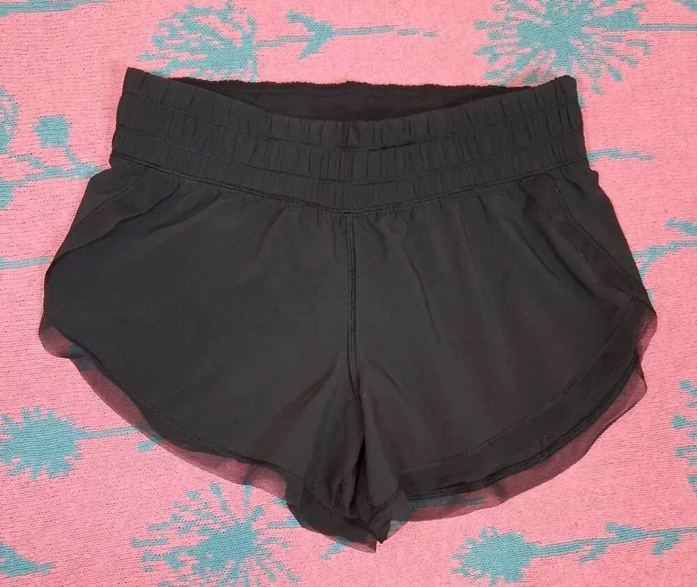 Lululemon womens size 4 mesh hem black running shorts gym Activewear athletic